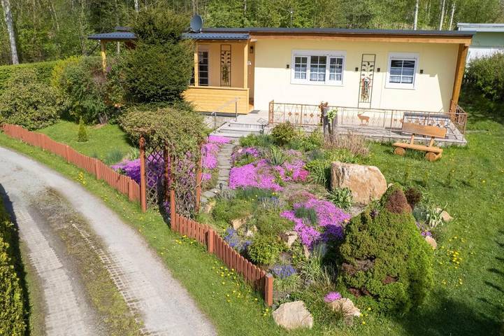 Ferienhaus für 4 Personen, mit Terrasse und Garten sowie Ausblick
