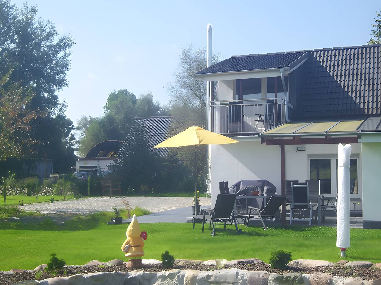 Ferienhaus 'Kudensee' mit Gemeinschaftsterrasse, privatem Garten und Wlan in Kudensee, Nord-Ostsee-Kanal