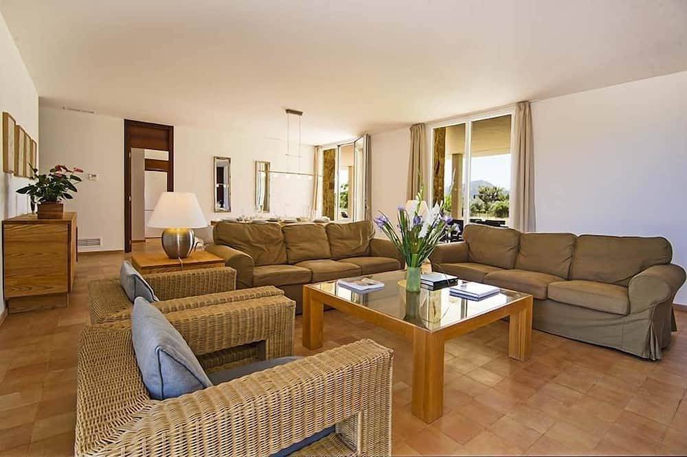 Luxury modern stone clad Villa with swimming pool and mountain views in Port de Pollença, Pollença