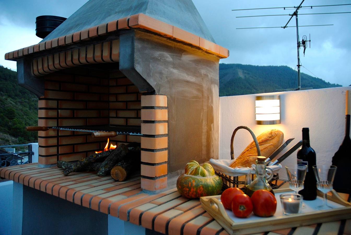 Casa rural 'Can Pitu' con vistas a la montaña, terraza privada y aire acondicionado in Alfondeguilla, Parc Natural de la Serra d'Espadà