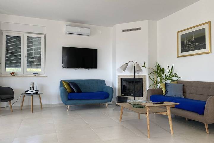 Ferienhaus für 8 Personen, mit Balkon und Garten