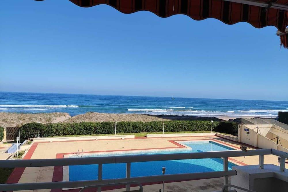 Apartamento entero, Piso frente al mar, con acceso privado a playa y piscina. in Sueca, Costa de Valencia