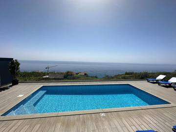 Gîte pour 7 personnes, avec piscine ainsi que jardin et vue dans Estreito da Calheta