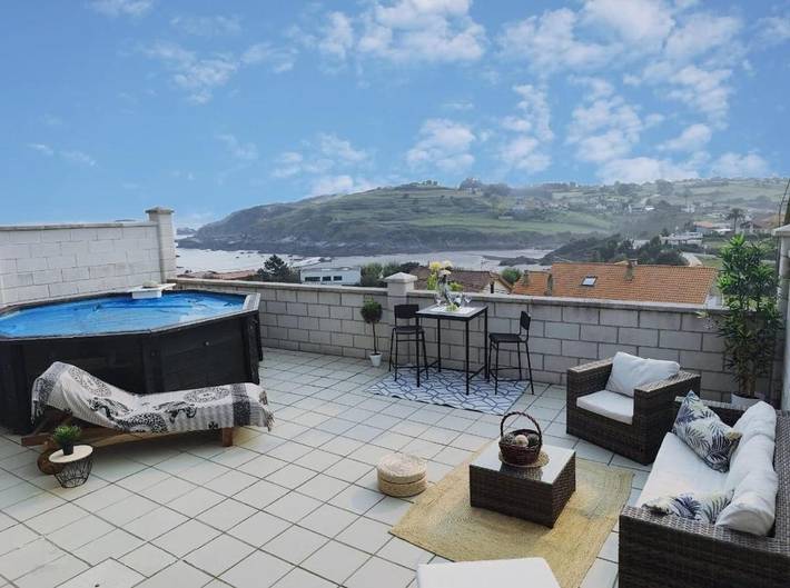 Apartamento para 8 personas, con piscina además de terraza y vistas en Castrillón