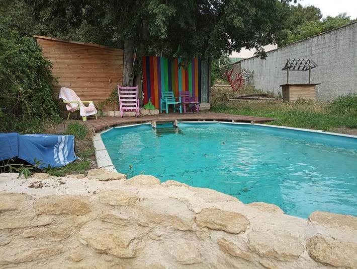 Appartement de vacances pour 4 personnes, avec jardin ainsi que piscine et terrasse