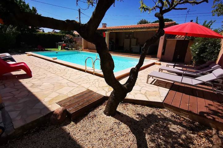 Appartement de vacances pour 4 personnes, avec Terrasse ainsi que Jardin et Piscine