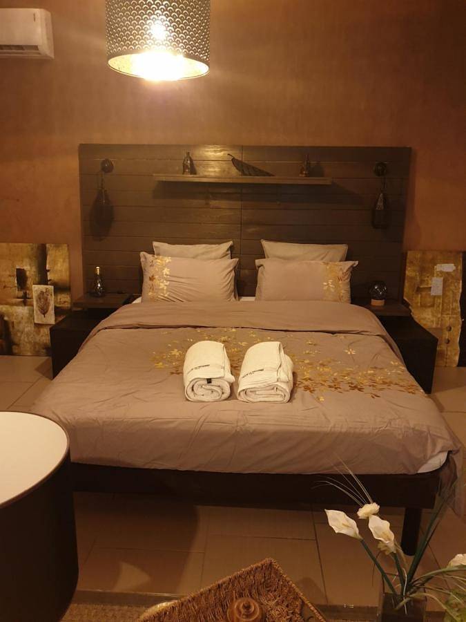 Appartement de vacances pour 4 personnes, avec Balcon et Terrasse ainsi que Jardin et Piscine