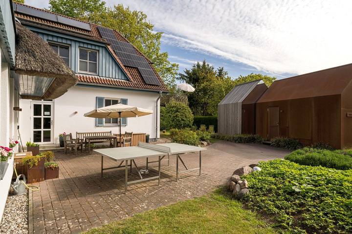 Ferienwohnung für 3 Personen, mit Terrasse und Garten sowie Sauna und Ausblick in Wieck am Darß