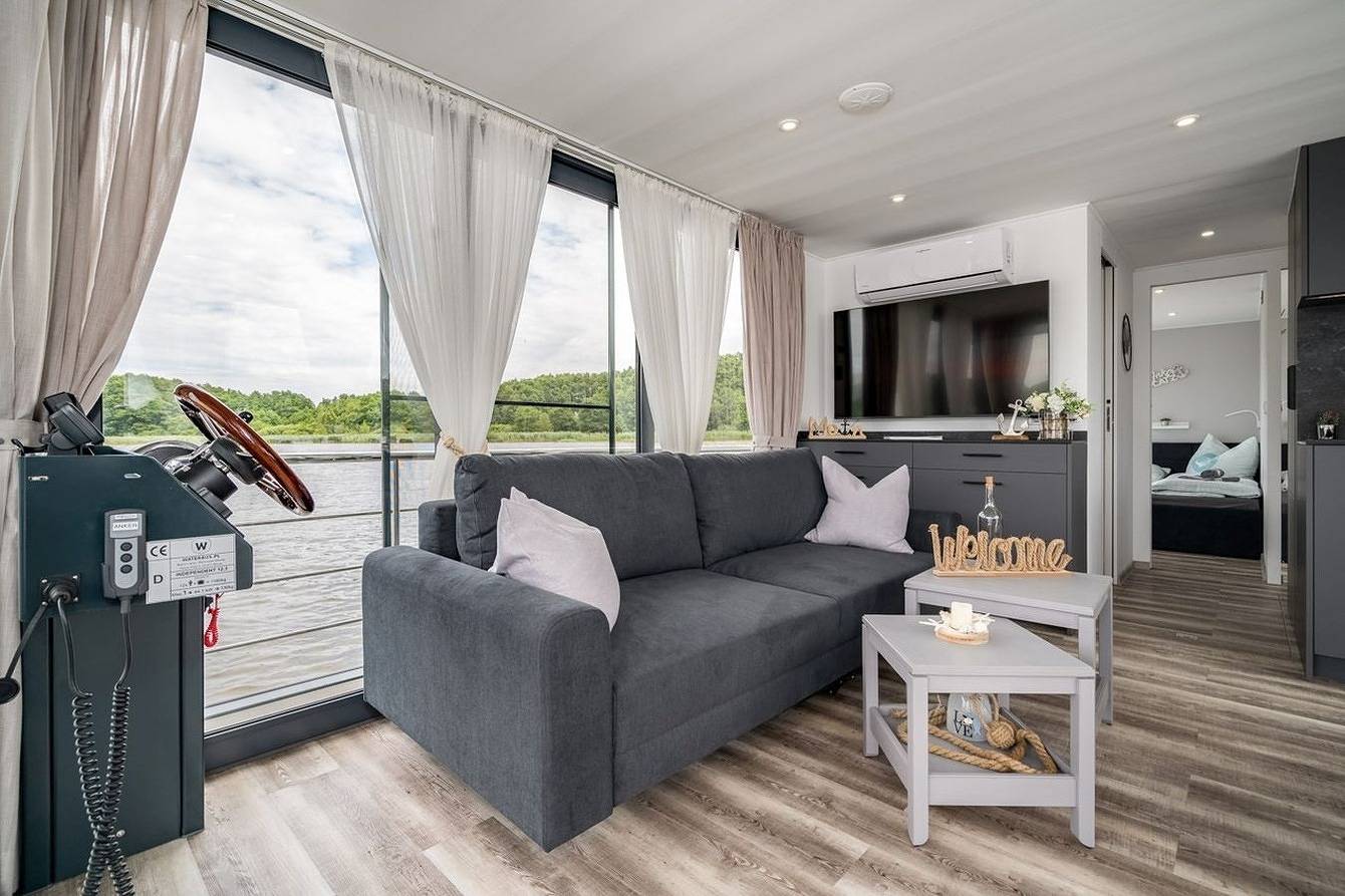 Ferienwohnung auf dem Wasser | H + M Lounge in Buchholz, Müritz