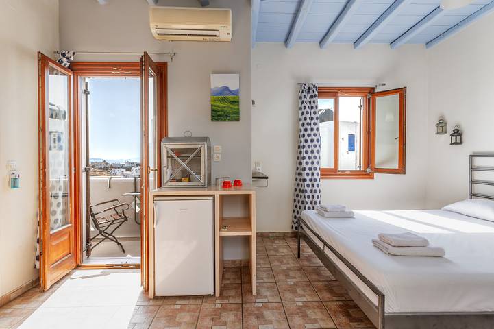 Maison d’hôte pour 3 personnes, avec balcon dans Tinos