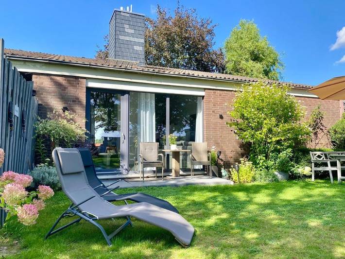 Ferienwohnung für 3 Personen, mit Terrasse und Garten sowie Ausblick