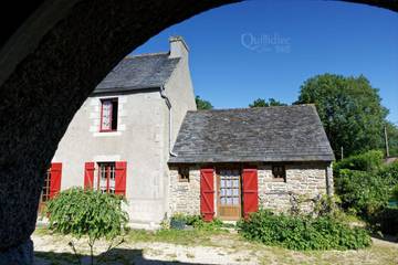 Gîte pour 3 personnes, avec terrasse ainsi que vue et jardin à Commana