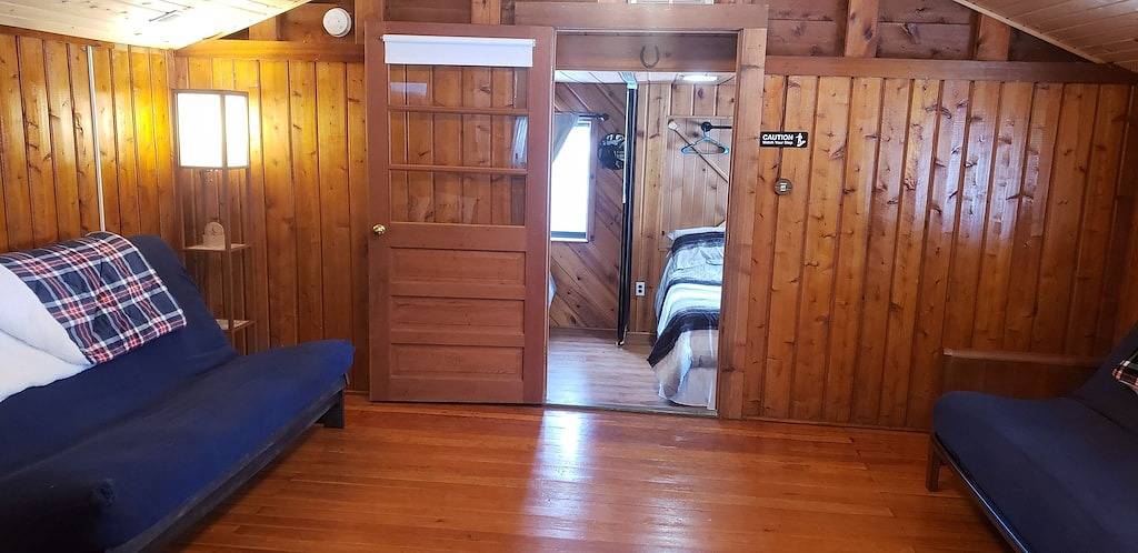 Sunrise Cove is a cozy cabin located within sight of Higgins lake & state land in Higgins Lake