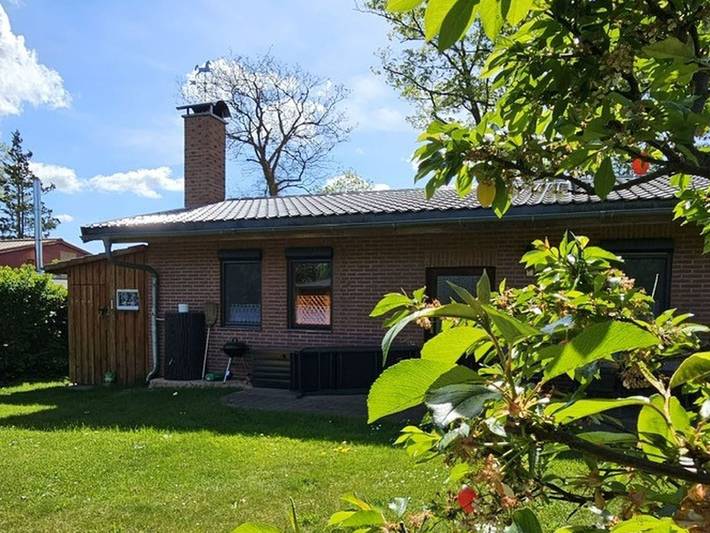 Ferienhaus für 4 Personen, mit Terrasse und Garten sowie Sauna und Seeblick in Mecklenburgische Schweiz
