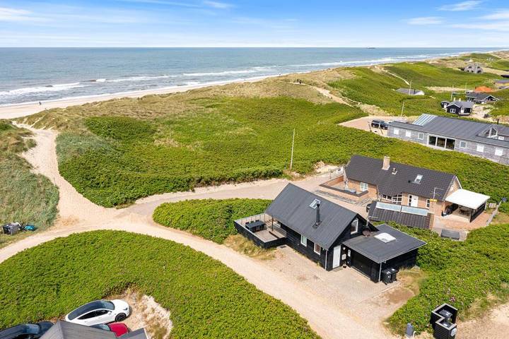 Ferienhaus für 4 Personen, mit Balkon/Terrasse und Whirlpool sowie Terrasse und Sauna in Holmsland Klit