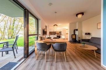 Ferienwohnung für 4 Personen, mit Garten und Seeblick sowie Sauna, mit Haustier in Krakow am See