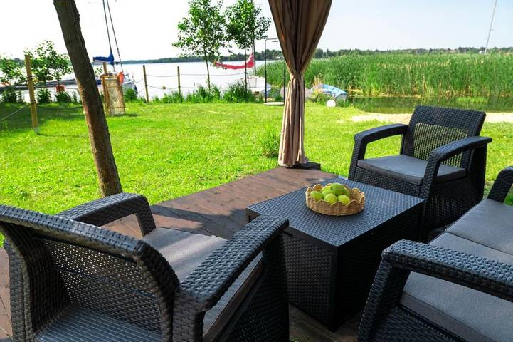 Location de vacances pour 4 personnes, avec vue sur le lac et sauna ainsi que vue et terrasse à Poznań - 3