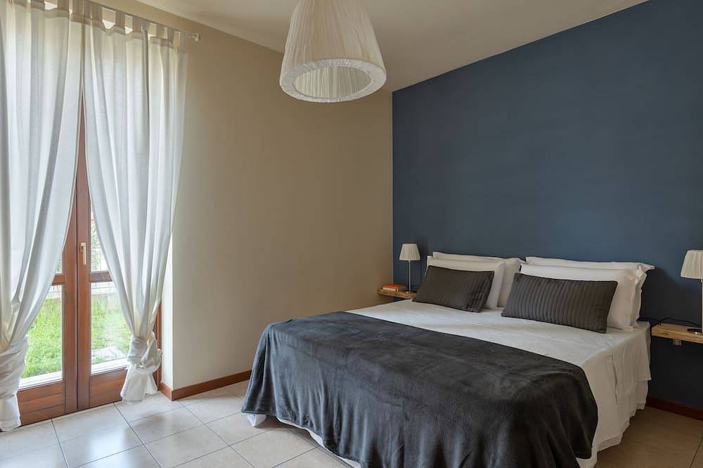 Geheel appartement, Appartement 3-kamers 7-bedden tuin Garage Gardasee wifi in Roè Volciano, Garda Bergen