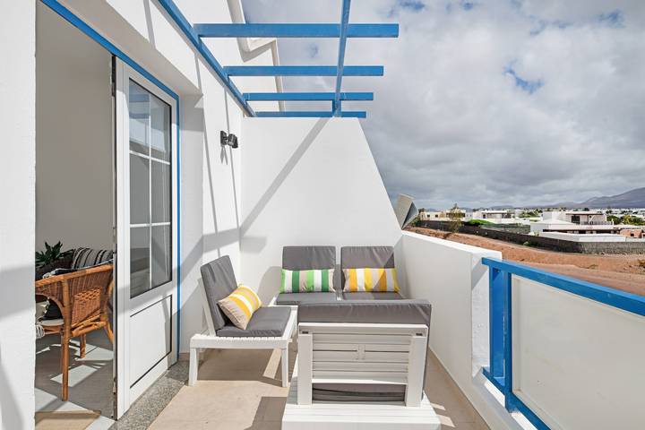 Ganze Wohnung, Ferienwohnung 'Atlantic Soul' mit Meerblick, privater Terrasse und WLAN in Playa Blanca, Yaiza