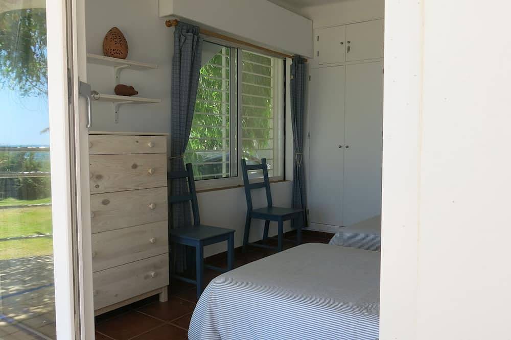 An air-conditioned villa, set in a large garden, on the first line of the beach in Los Caños de Meca, Barbate