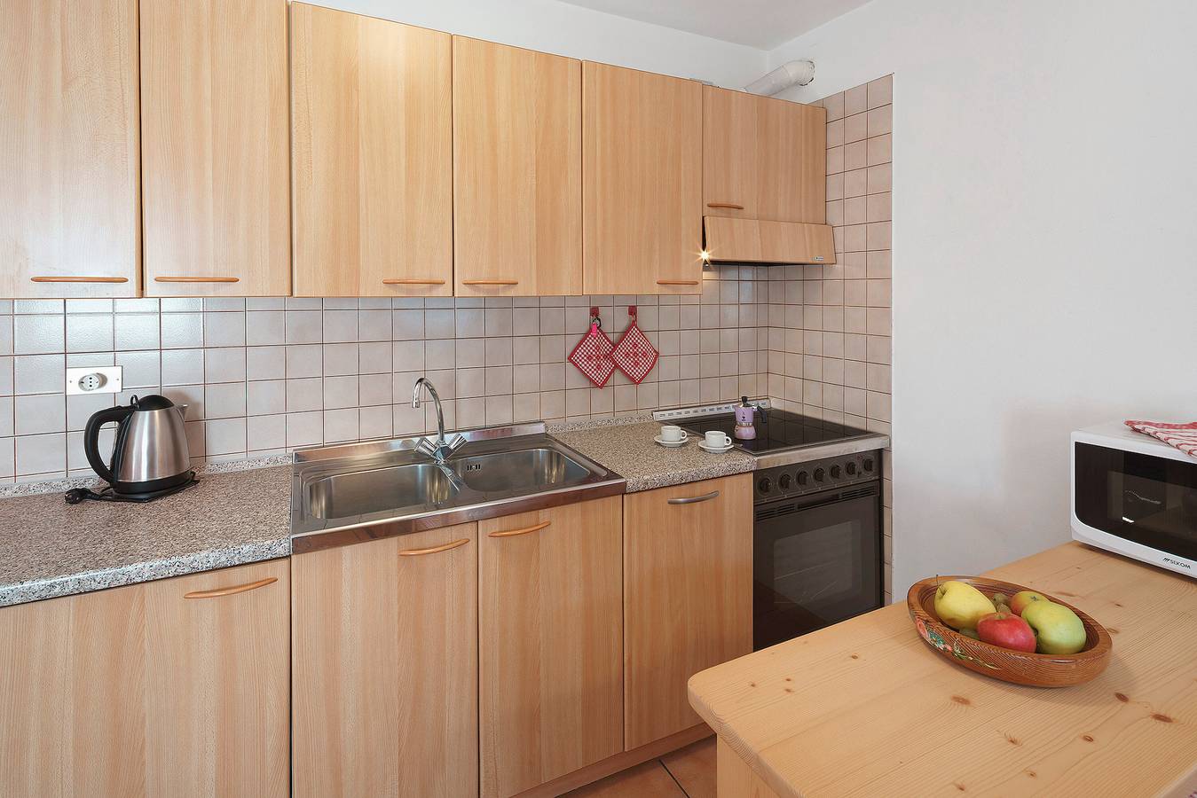 Appartement entier, Appartement de vacances "Ciasa Lino Rotic" avec vue sur les montagnes et Wi-Fi in Pozza di Fassa, San Giovanni di Fassa