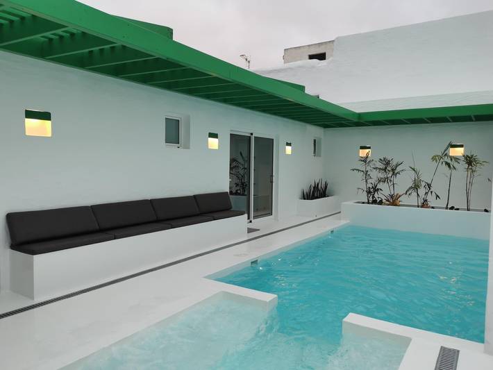Maison de vacances pour 4 personnes, avec Terrasse ainsi que Jardin et Piscine dans Tiagua