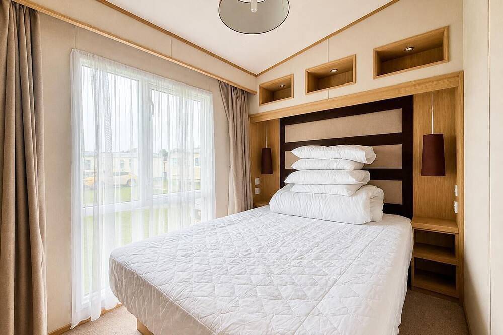 Homely caravan with decking at Golden Sands Haven Holiday Park in Mablethorpe, Lincolnshire