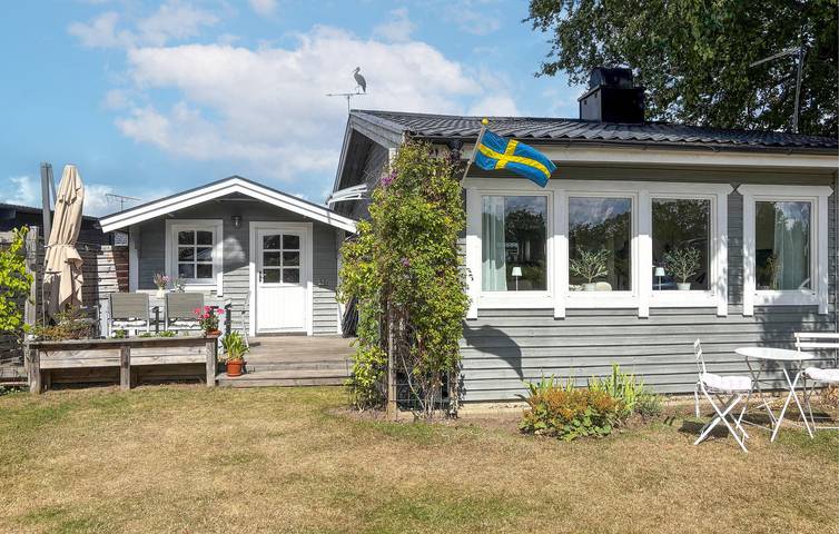 Ferienhaus für 4 Personen, mit Terrasse und Seeblick sowie Garten - 1