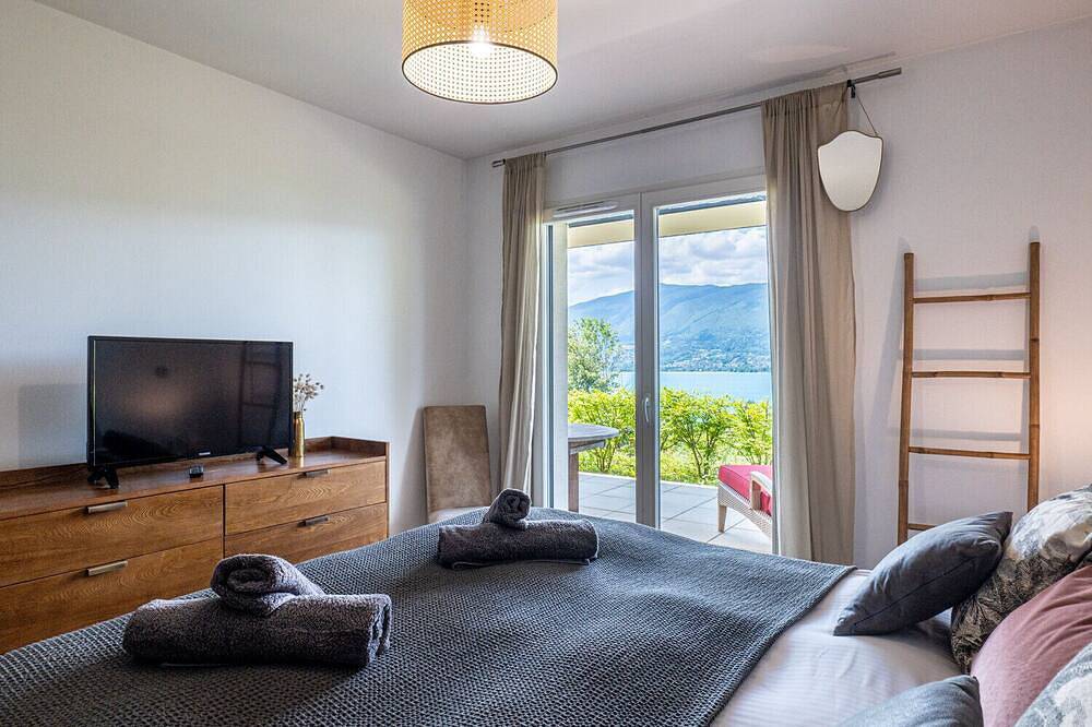 Appartement entier, Eos – Superbe appart vue lac, 2 ch, parking in Veyrier-du-Lac, Région d'Annecy