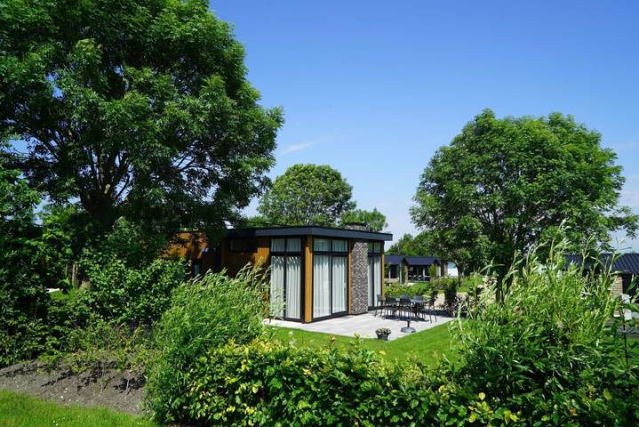 Ferienhaus für 4 Personen, mit Balkon/Terrasse und Terrasse sowie Garten