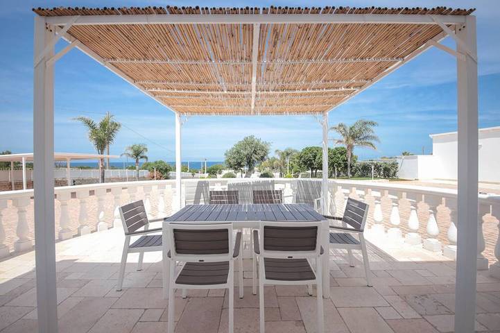 Maison de vacances pour 7 personnes, avec terrasse ainsi que jacuzzi et jardin à Capitolo