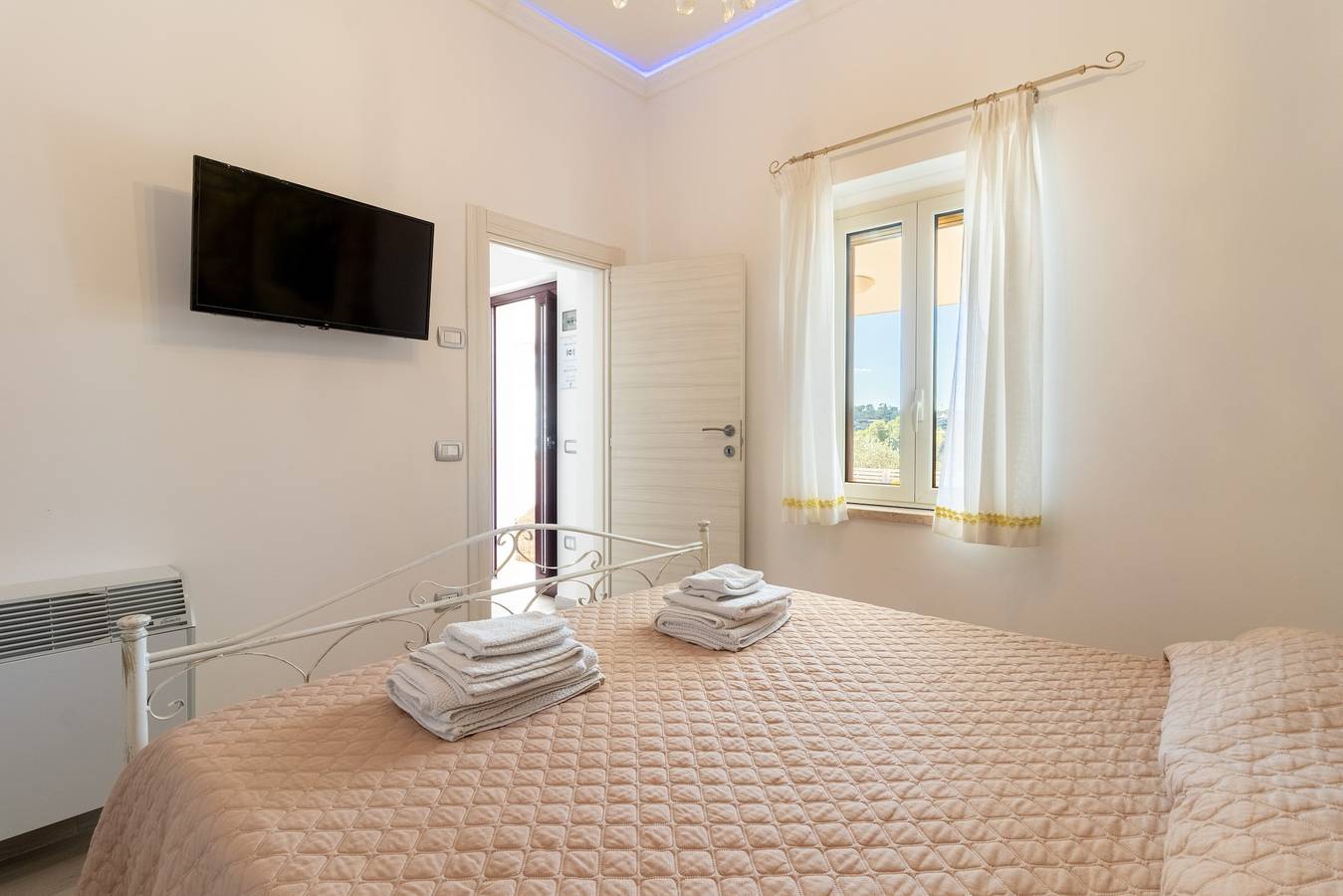 Appartement entier, Appartement 'Romantica' avec piscine partagée, Wi-Fi et climatisation in Putignano, Province de Bari