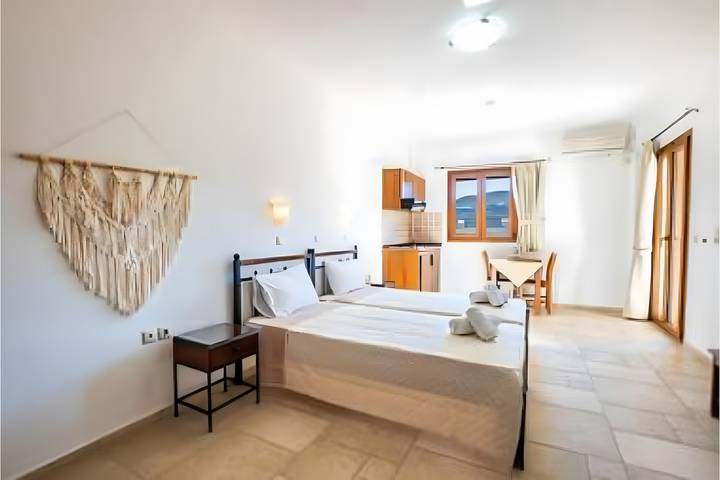 Appartamento per 3 persone, con giardino e balcone a Scarpanto
