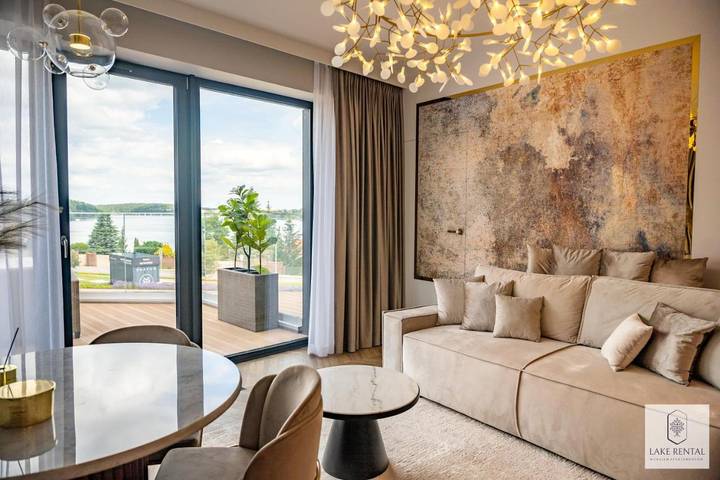 Ferienwohnung für 4 Personen, mit Sauna und Seeblick sowie Garten und Ausblick, mit Haustier in den Masuren