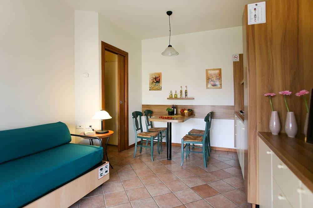 Schöne Wohnung in einem Ferienhaus für 4 Leute mit  W-Lan, Klimaanlage, Pool, Tv und Terrasse in Colombare, Sirmione