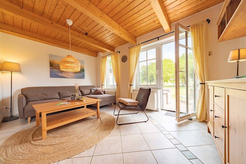 Lüttje Huck Ferienwohnung 1 - mit Seeblick & Sauna in Aurich, Landkreis Aurich
