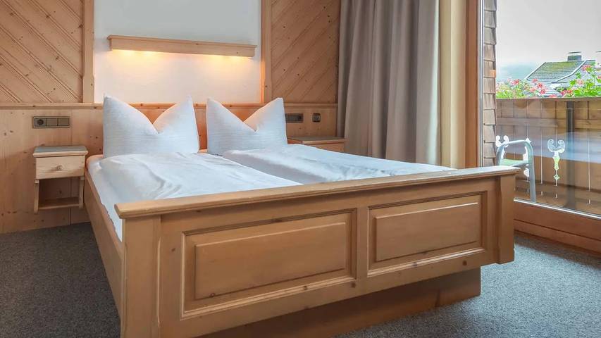 Appartement voor 4 personen, met balkon en tuin in Bichlbach