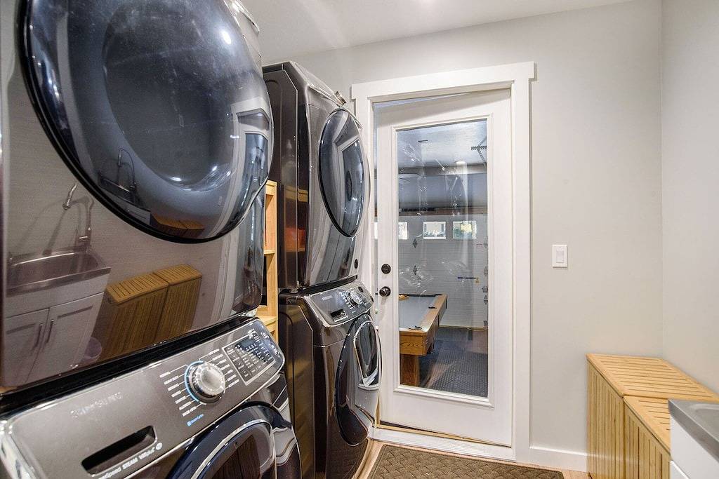 Modern & Spacious Holland home with a hot tub, pool table, fire pit and more! in Macatawa, Allegan County