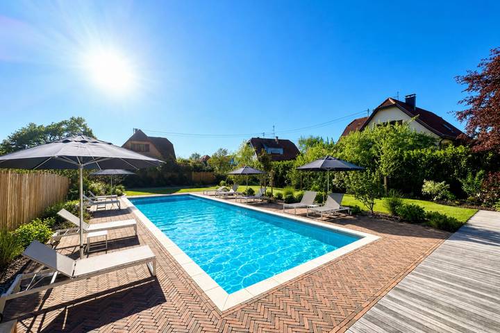 Location de vacances pour 14 personnes, avec balcon ainsi que jardin et piscine, adapté aux familles à Hangenbieten