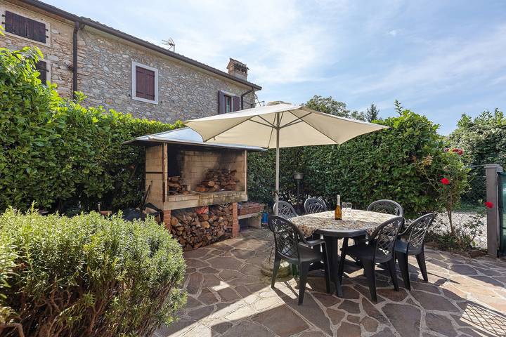 Apartamento para 4 personas, con Balcón además de Jardín y Vistas al lago en Lago de Garda