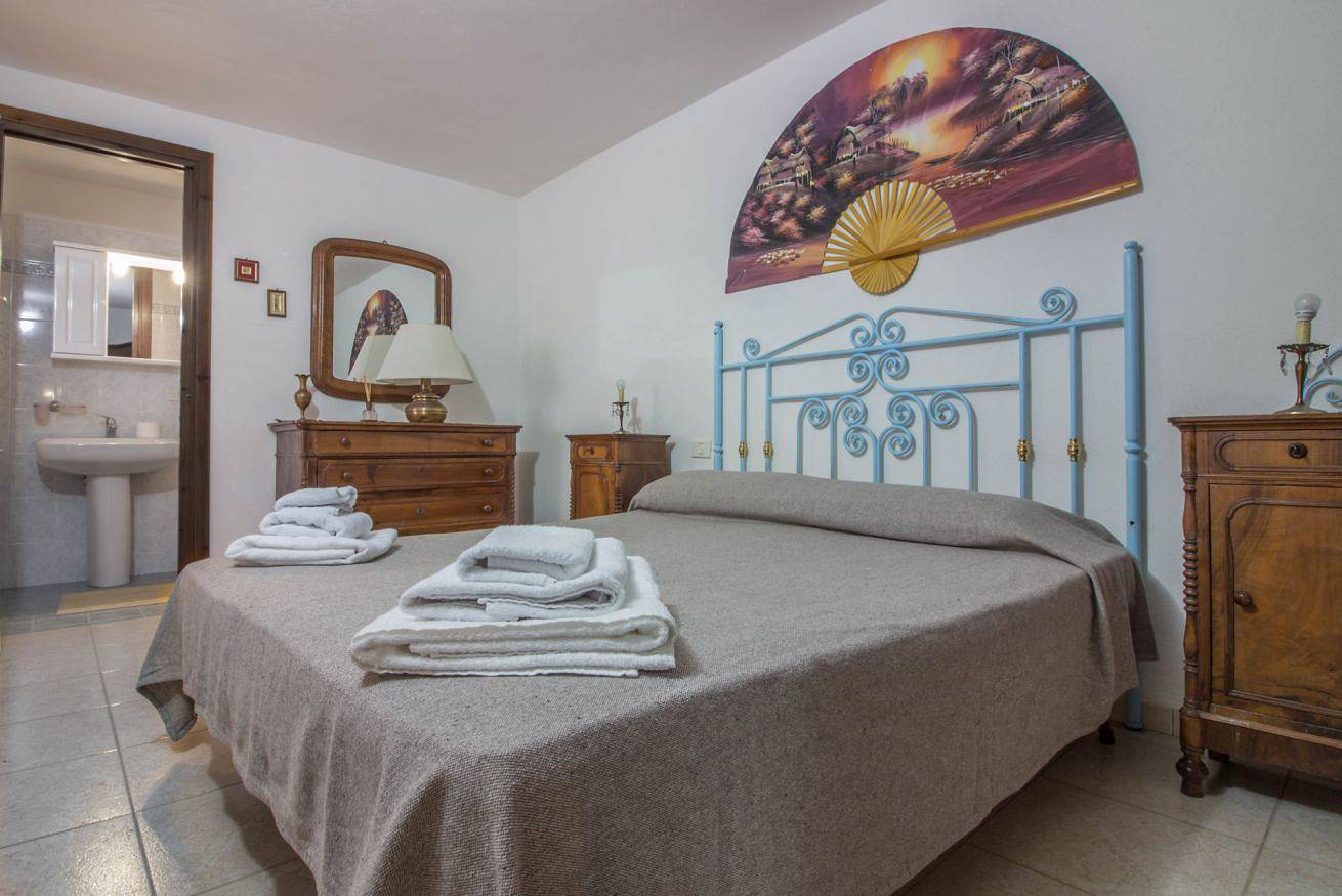 Appartamento intero, Guesthost - Cozy Flat with Garden & Parking in Porto San Paolo, Loiri Porto San Paolo