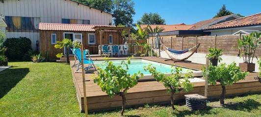 Maison de campagne pour 4 personnes, avec terrasse et piscine ainsi que jardin et vue à Seignosse
