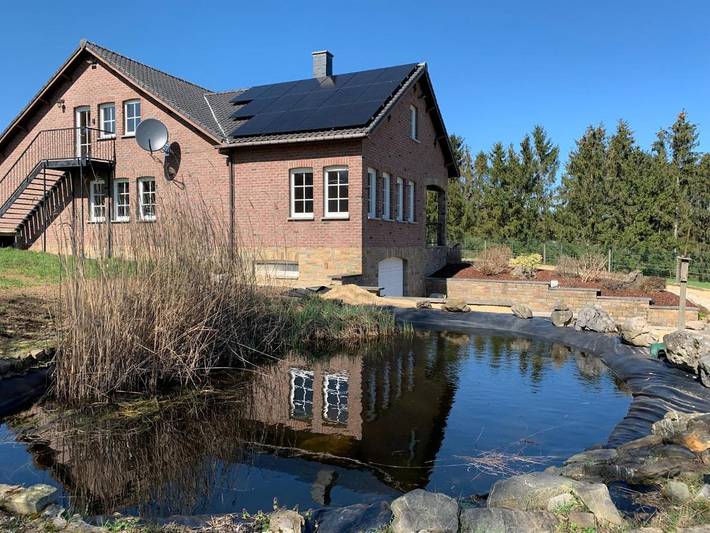 Cottage pour 16 personnes, avec jardin et vue dans Membach