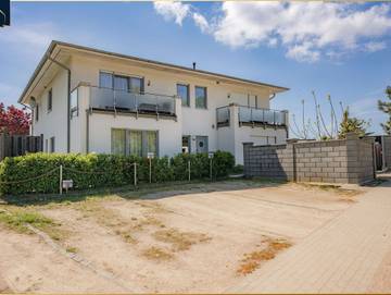 Ferienwohnung für 3 Personen, mit Seeblick und Balkon sowie Garten, kinderfreundlich in Korswandt