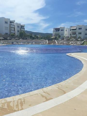 Gîte pour 4 personnes, avec piscine ainsi que balcon et vue dans Marina Smir