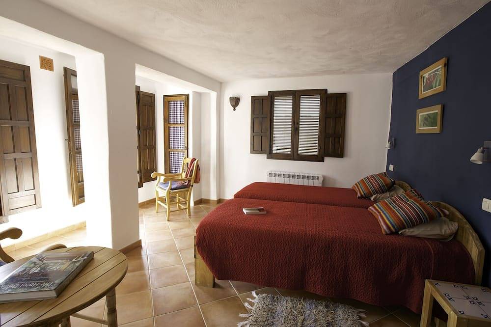 Habitaciones lujuosas con baño privados. Cocina, terazza y salon compartido. in Entorno de Sierra Nevada, Güejar Sierra
