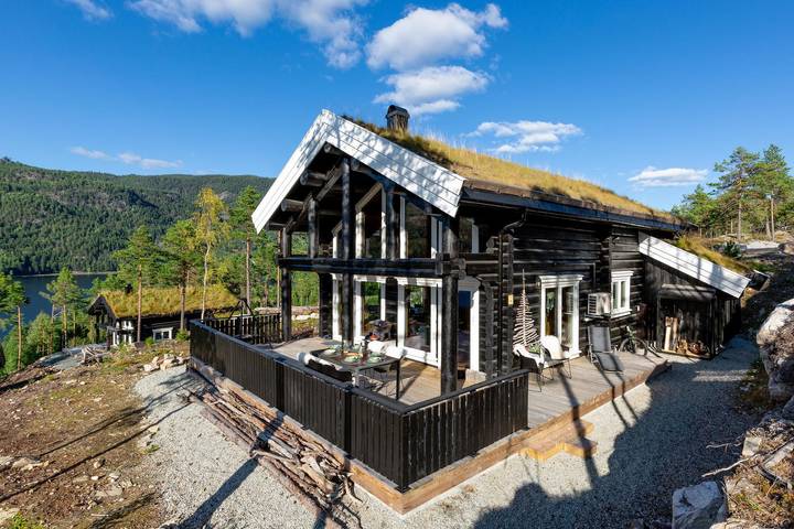 Ferienhaus für 6 Personen, mit Terrasse und Garten sowie Sauna und Seeblick in Norwegen