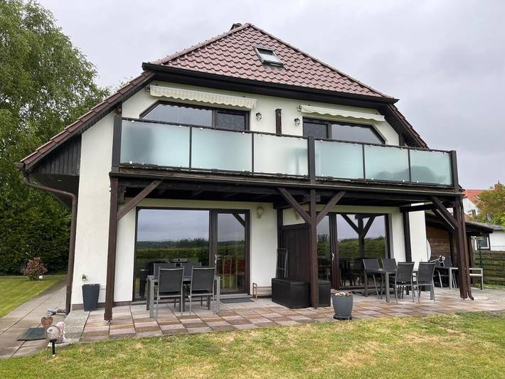 Ferienwohnung für 4 Personen, mit Ausblick und Seeblick sowie Garten in Börgerende-Rethwisch