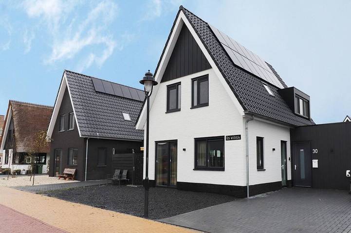 Ferienhaus für 8 Personen, mit Whirlpool und Terrasse sowie Garten und Sauna