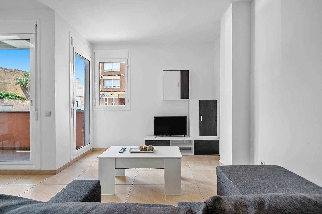 Apartamento entero, Apartamento 'Sara' con terraza privada, Wi-Fi y aire acondicionado in La Aldea, Delta del Ebro